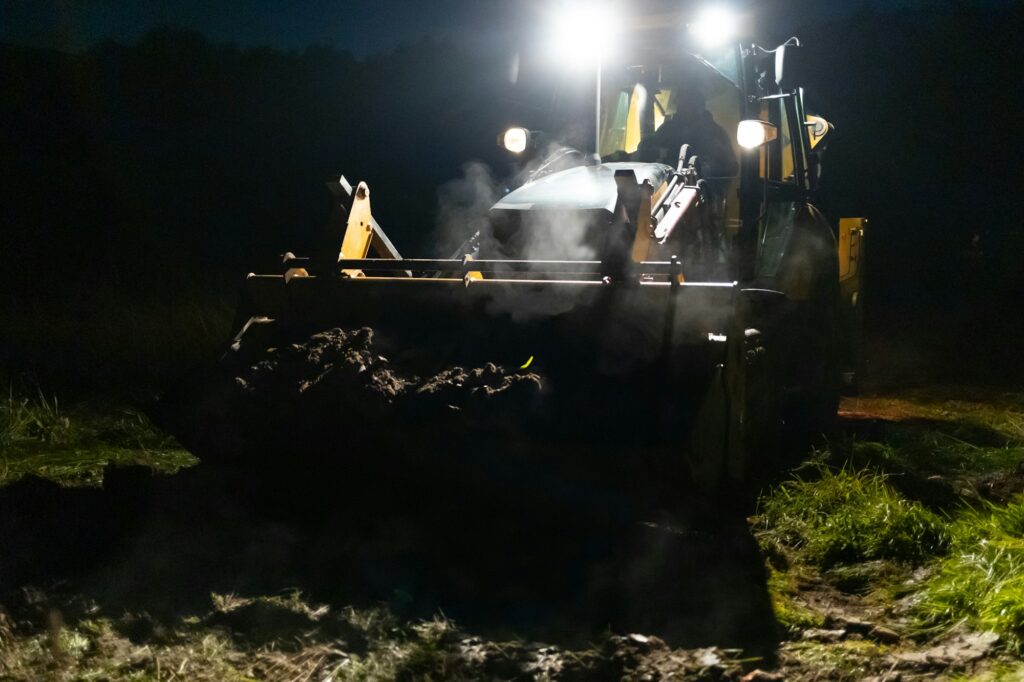 Excavator during night work